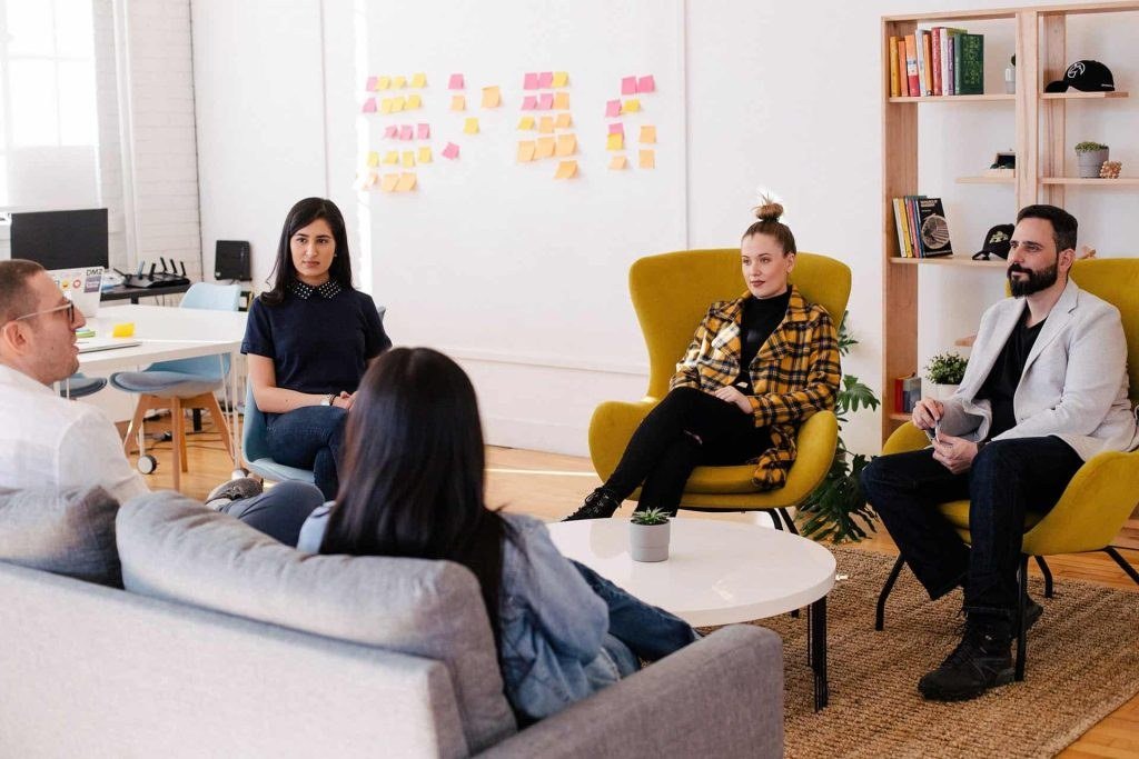 Entrepreneurship coaching session with a startup team